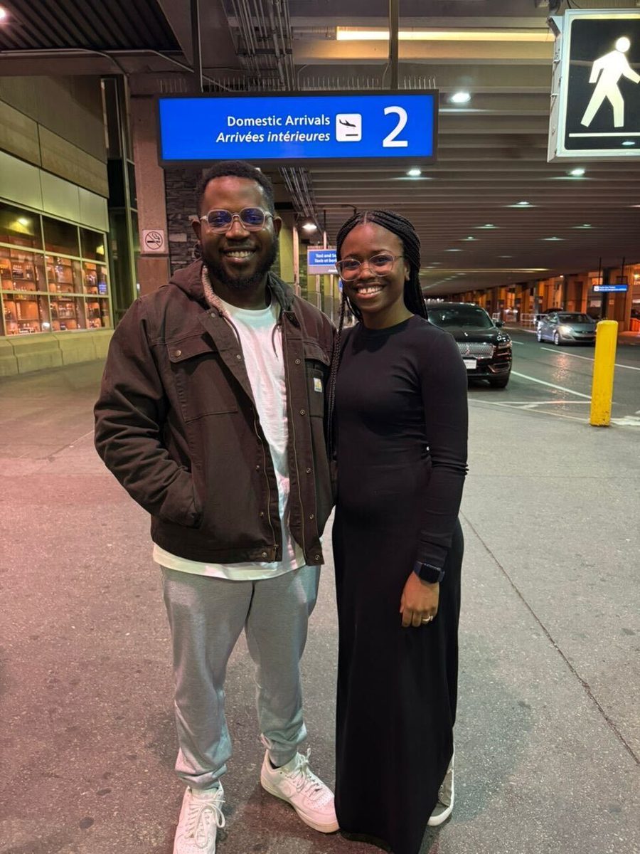 A relocated engineer and his wife at Toronto airport arrivals